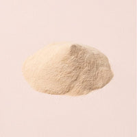 Pale wheat cellulase powder on blush-oat