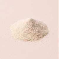 Ivory protease powder on blush-oat